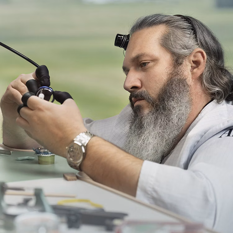Watchmaker at the Grande Complication Atelier, in the museum Musée Atelier Audemars Piguet, Le Chenit, Switzerland.