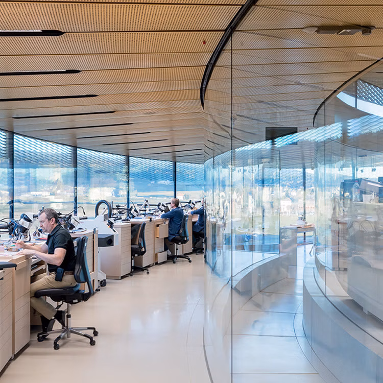 Craftpeople working at the Métiers d'Art Atelier in the museum Musée Atelier Audemars Piguet, Le Chenit, Switzerland.