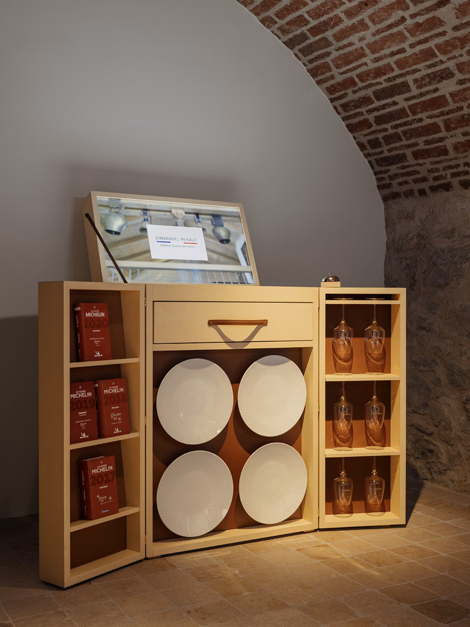 An open mast filled with objects referring to cooking