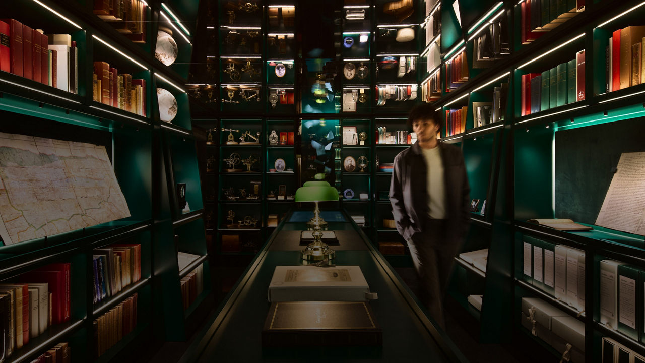 Visitor walking through the AP library that contains artifacts and documents pertaining to the company's history.