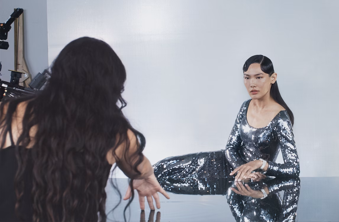 Harley Weir photographing a model wearing a Royal Oak Frosted Gold Selfwinding