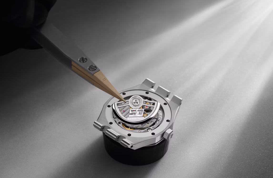 A Royal Oak watch being assembled by a watchmaker.