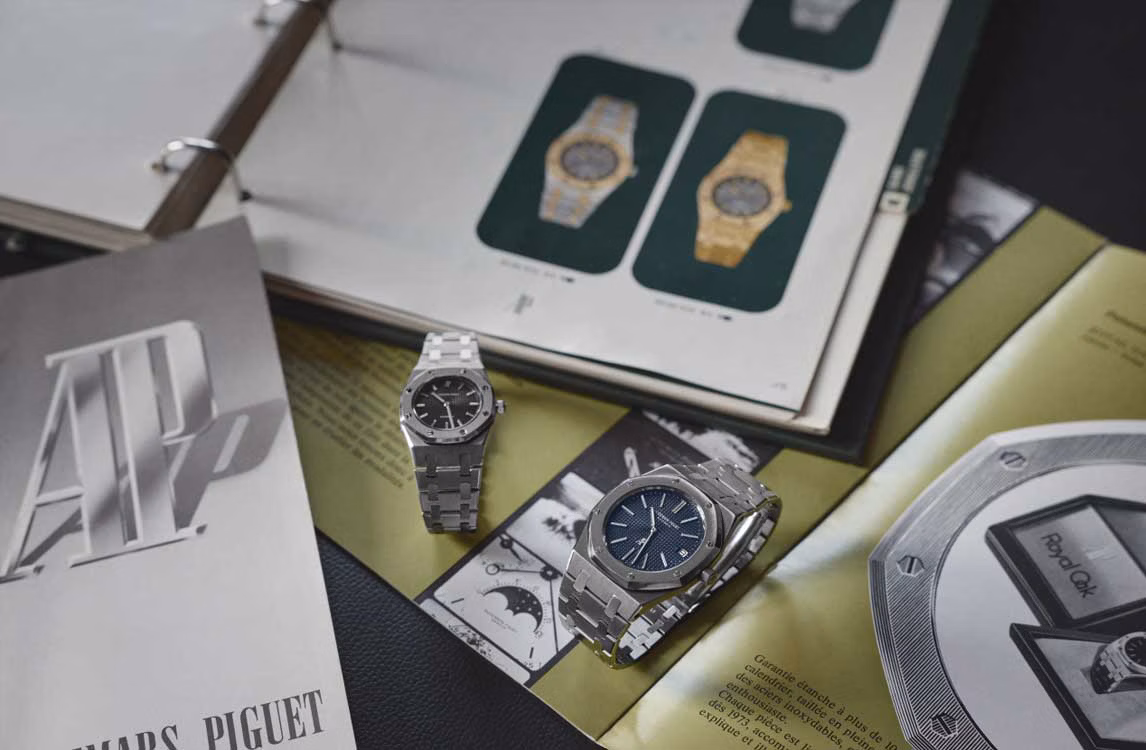 Two Royal Oak watches in the middle of advertisements