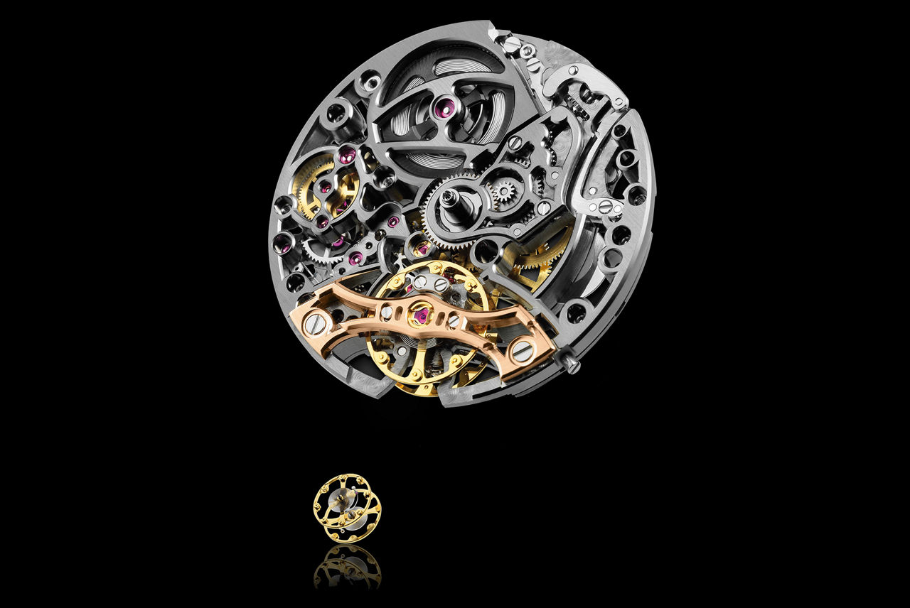 A movement with double balance wheel escapement