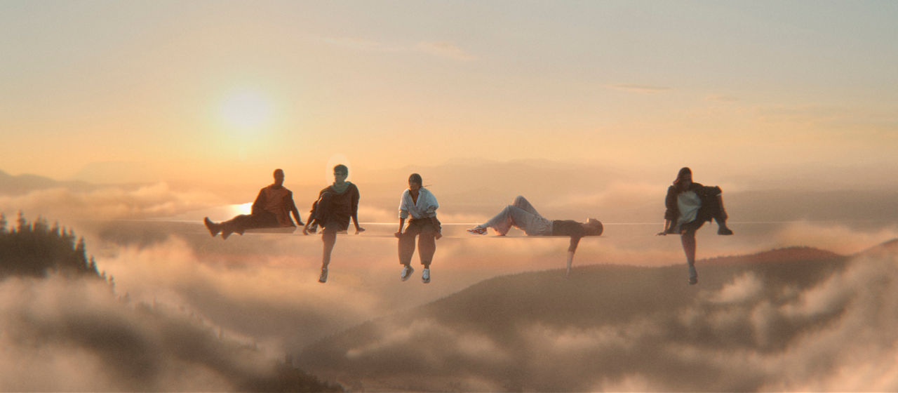 "Seek Beyond" Audemars Piguet campaign: five people sitting on an imaginary line in the sky 