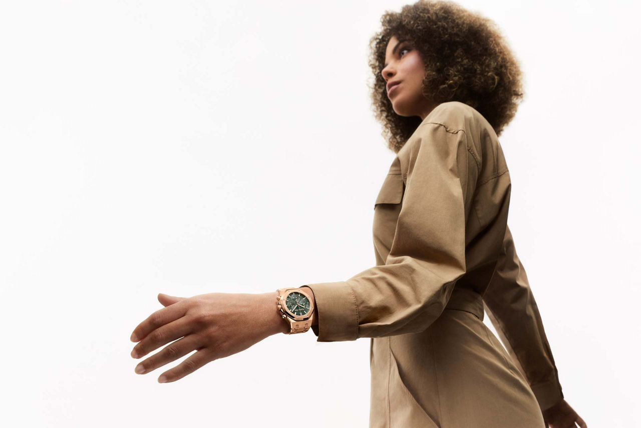 Someone winding a Royal Oak watch.