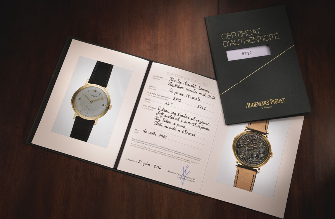 Someone winding a Royal Oak watch.