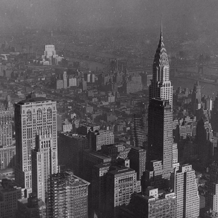 Historical black & White picture of the New York City skyline with the Chrysler buidling